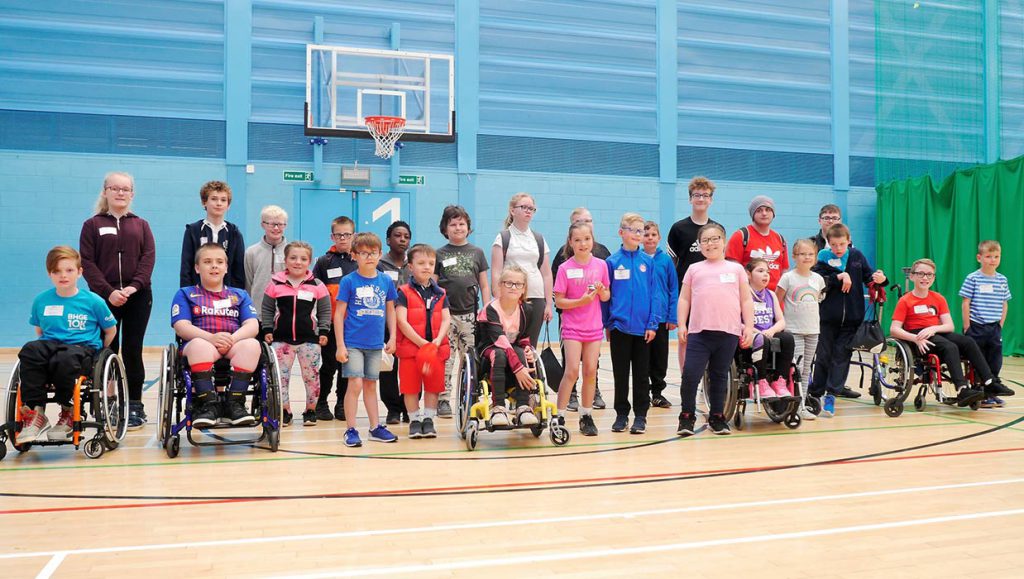 a picture of Kids taking part in activities in sports hall
